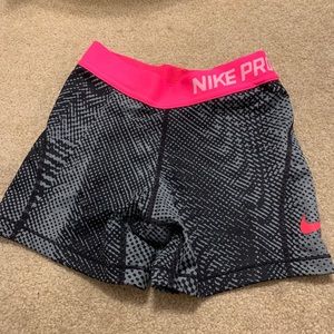 Black and Pink patterned nike pros